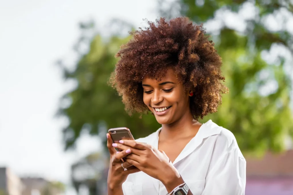 woman looking at phone